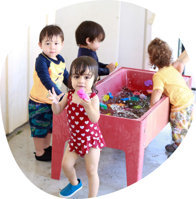 Kids playing in water play